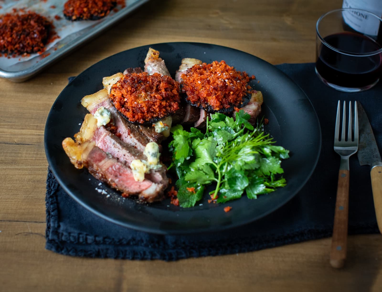 Striploin steak with stuffed mushroom, nduja and blue cheese